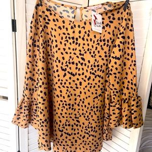 "Stylish and cool animal print blouse perfect for this spring season!"